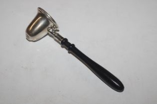 A silver candle snuffer with turned wooden handle,