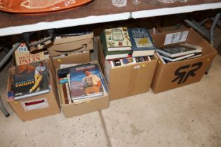 A large collection of books including travel and r