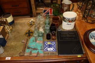 A collection of various Victorian glass ink bottle