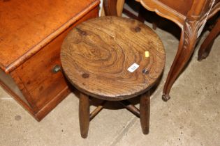 A rustic elm stool