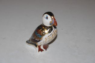 A Royal Crown Derby paperweight in the form of a P