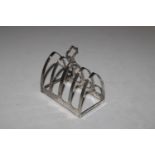 A silver four slice toast rack, Hallmarked Birming