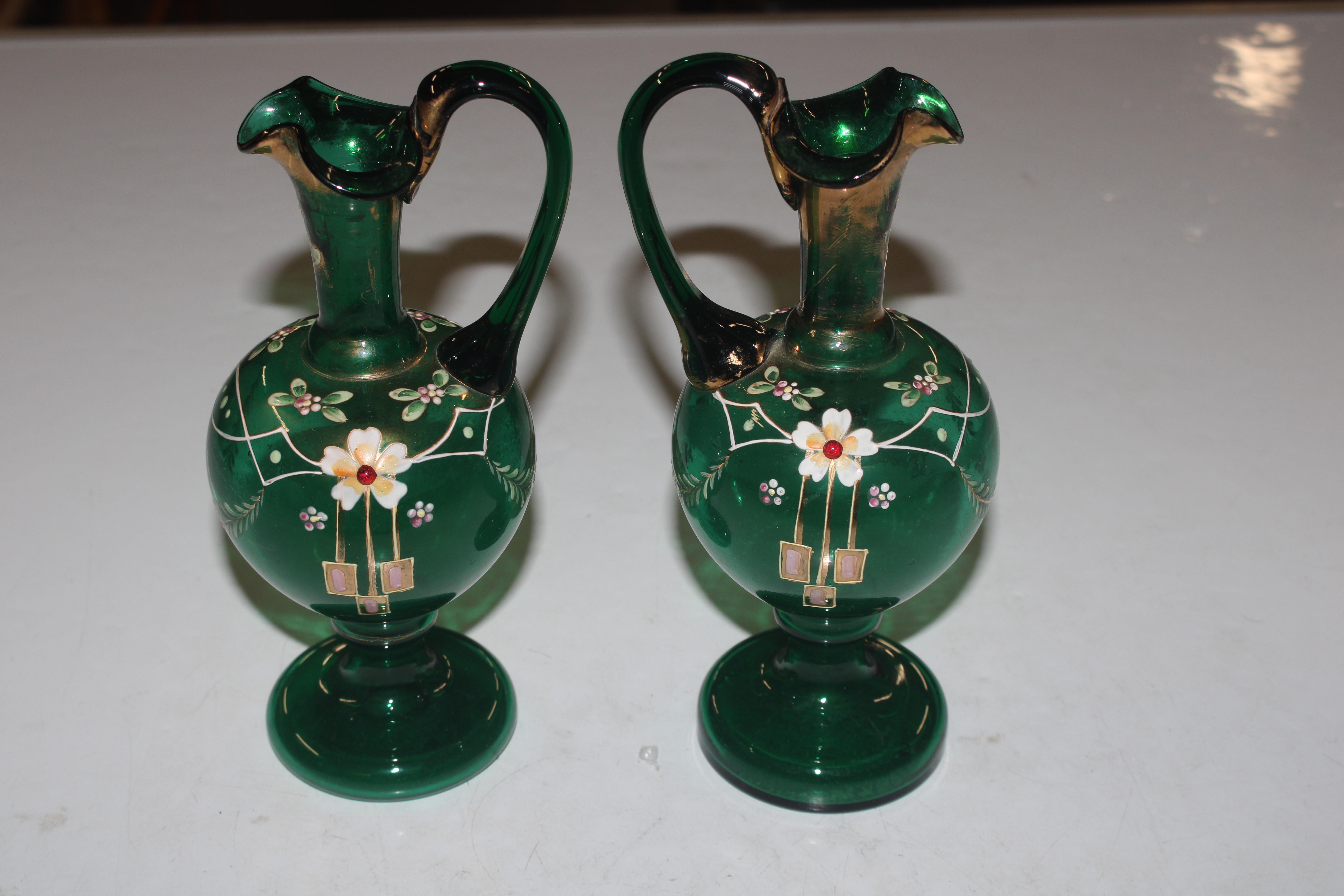 A pair of Victorian green glass ewers - Image 5 of 7