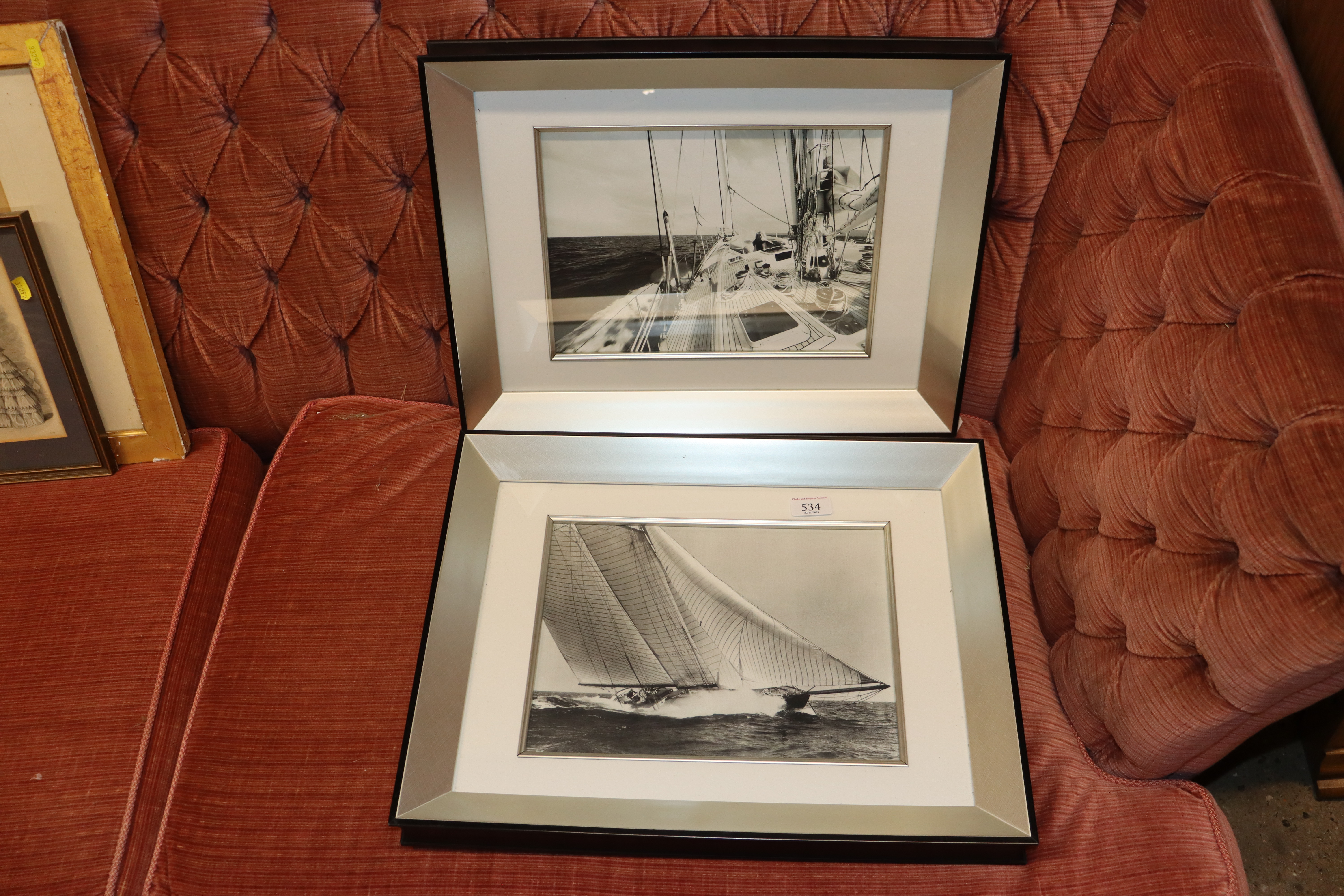 A pair of framed and glazed photographs of racing