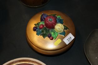 A Shelly lustre decorated bowl and cover with frui