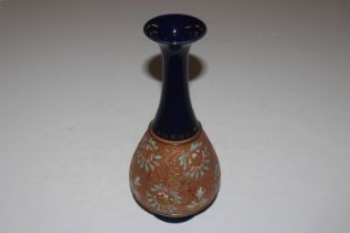 A Royal Doulton vase with stylised floral decorati