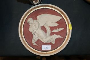 A 19th Century Ipsen pottery plaque depicting ang