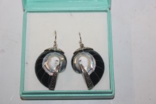 A pair of Sterling silver conch shell ear-rings