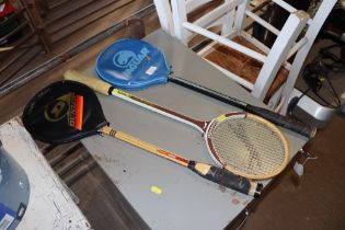 Three vintage sporting rackets