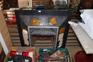 A cast iron and tiled fire surround