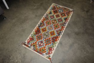 An approx. 4'9" x 2' Chobi Kelim runner