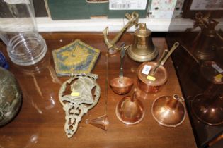 A collection of various copper and brass ware incl