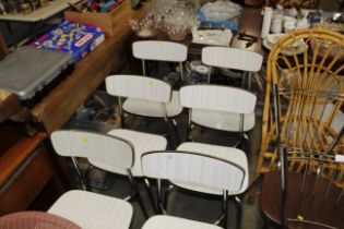 A set of six metal framed and Formica chairs