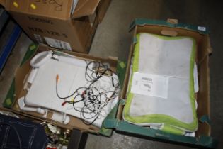 Two boxes containing Nintendo Wii boards and acces