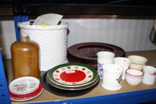 A collection of lacquered plates; various decorati