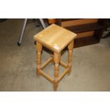 A pine kitchen stool