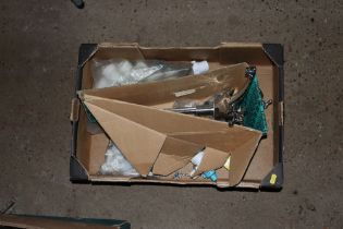 A box containing mixer tape and various fittings