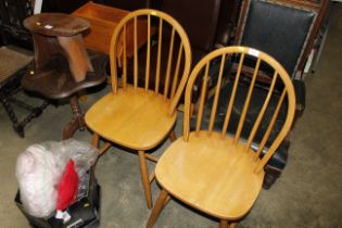 A pair of stick back chairs