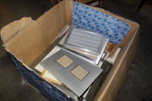 A box of miscellaneous picture frames