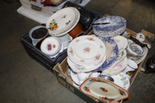 Two boxes containing various patterned tea and din