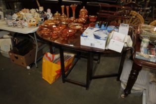 An oak Ercol gate leg dining table