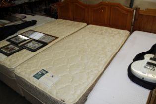 A Carlton single divan bed and mattress with pine
