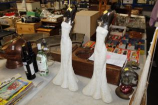 Two studio type figurines