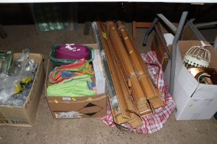 A quantity of various blinds and bed linen