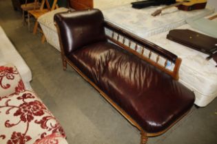 An Edwardian upholstered chaise longue