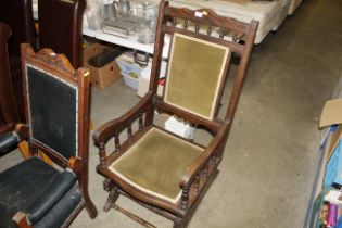 An Edwardian spindle back rocking chair