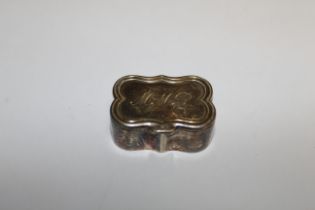A shaped silver pill box initialled to the lid MMR