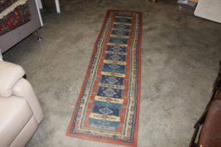 An approx. 7'6" x 2' Eastern pattern runner