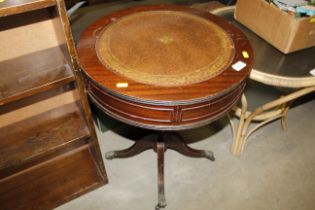 A circular mahogany and leatherette inset drum sha