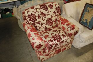 A floral upholstered armchair