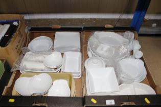 Two boxes of white glazed dinnerware and oven ware