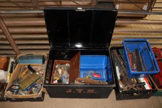 A metal box and contents of various hand tools