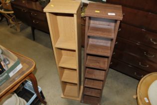 A pair of laminate CD storage racks