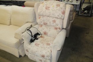 A floral upholstered electric rise and recline arm