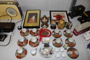 A collection of Oriental items including cups and