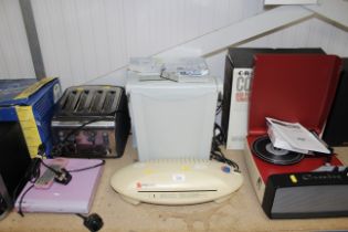 A Rexel laminator and a paper shredder