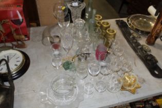 A collection of table glassware to include perfume