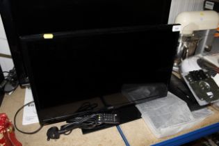 A Logix flat screen television with remote control