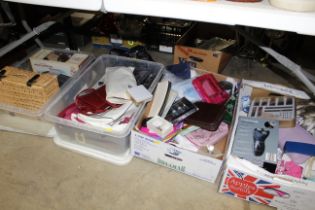 Four boxes containing slippers; bags etc