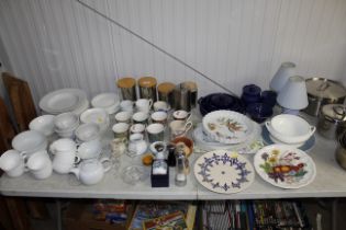 A collection of white glazed dinnerware; blue glaz