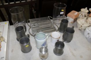 Two warming stands, two candle lanterns, pewter an