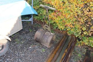 A cast iron garden roller