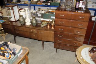 A retro faux veneer six drawer chest and matching