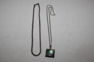 A .925 silver necklace hung with pendant and a whi