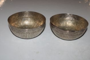 A pair of Eastern white metal bowls, approx. total