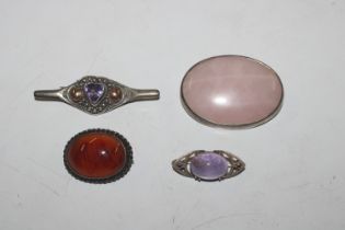 A 925 silver brooch set with amethyst coloured sto